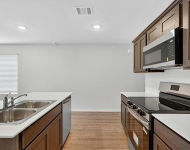 7007 Cottonseed Drive - Photo Thumbnail 7