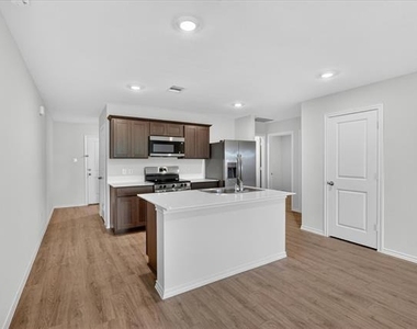 7007 Cottonseed Drive - Photo Thumbnail 1