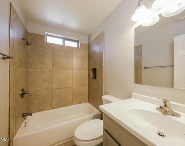 9709 N 57th Avenue - Photo Thumbnail 1