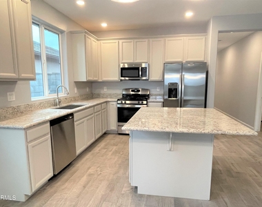 13227 W Buckskin Trail - Photo Thumbnail 3