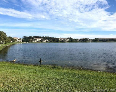 5005 Wiles Road - Photo Thumbnail 5