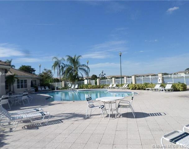 5005 Wiles Road - Photo Thumbnail 7