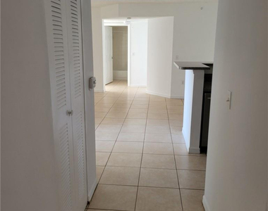 5005 Wiles Road - Photo Thumbnail 9