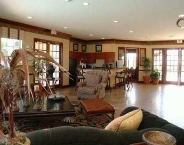 5005 Wiles Road - Photo Thumbnail 3