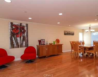 7019 Woodstone Place - Photo Thumbnail 3