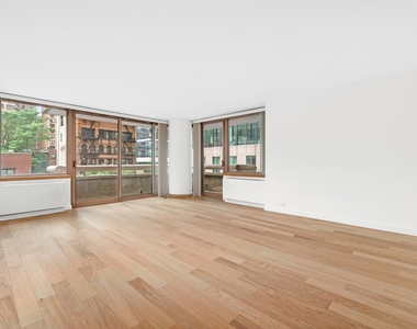 235 E 40th St - Photo Thumbnail 1