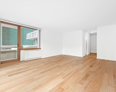235 E 40th St - Photo Thumbnail 2