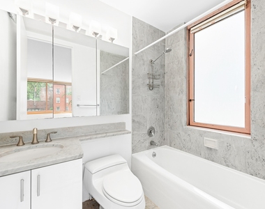 235 E 40th St - Photo Thumbnail 6