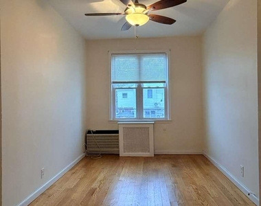 7731 166th Street - Photo Thumbnail 1