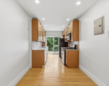 207-10 42nd Avenue - Photo Thumbnail 3