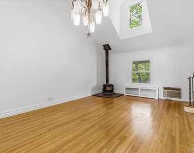 207-10 42nd Avenue - Photo Thumbnail 4