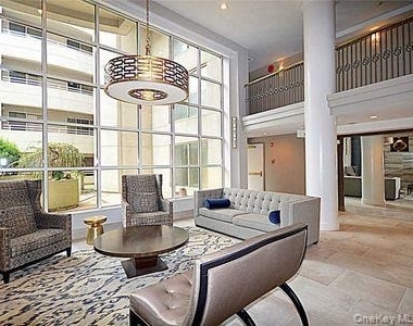 100 Cuttermill Road - Photo Thumbnail 3