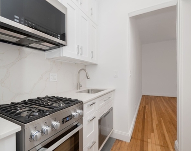 353 W 44th Street - Photo Thumbnail 3