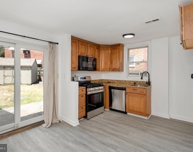 2446 S Nelson Street - Photo Thumbnail 4