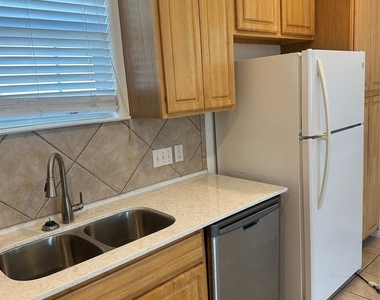 5401 Evans Ave - Photo Thumbnail 3