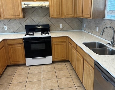5401 Evans Ave - Photo Thumbnail 2