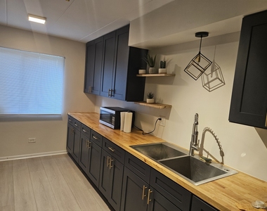 14033 S Laramie Avenue - Photo Thumbnail 3