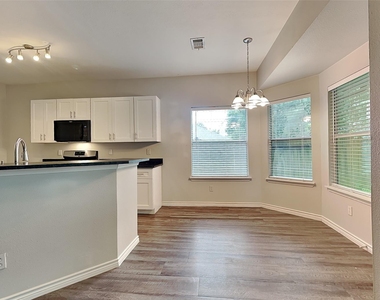 10931 S Falls Terrace - Photo Thumbnail 2