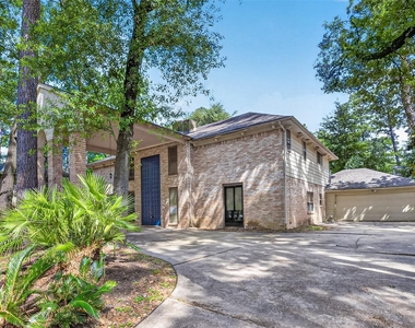 8103 Oak Moss Drive - Photo Thumbnail 1