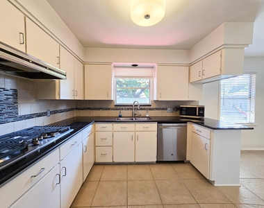 9507 Meadowbriar Lane - Photo Thumbnail 9