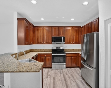 7020 Ambrosia Lane - Photo Thumbnail 7