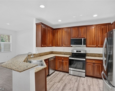 7020 Ambrosia Lane - Photo Thumbnail 6
