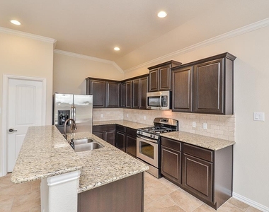 9411 Sparrow Creek Court - Photo Thumbnail 12