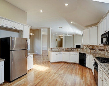 9907 Kemp Forest Drive - Photo Thumbnail 9