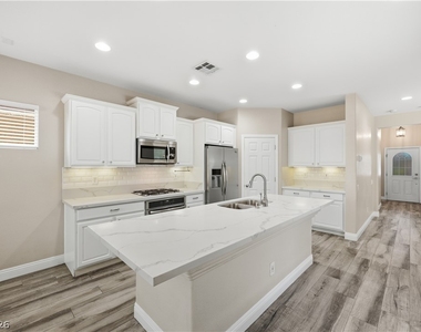 10416 Miners Gulch Avenue - Photo Thumbnail 3