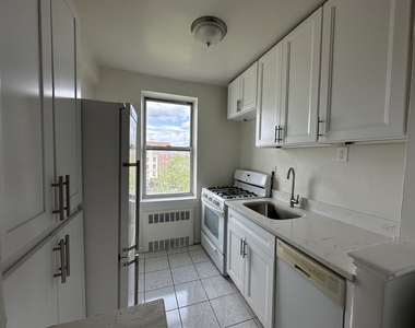 105-24 64th Road - Photo Thumbnail 3