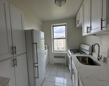 105-24 64th Road - Photo Thumbnail 4