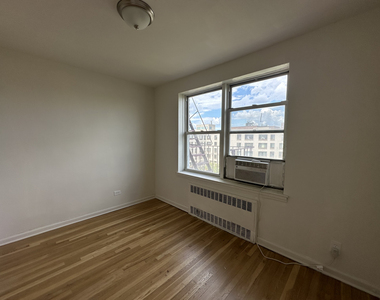 105-24 64th Road - Photo Thumbnail 2
