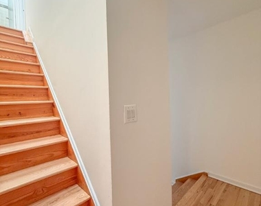 E 12th St - Photo Thumbnail 9