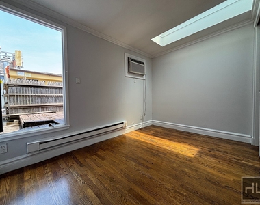 E 13th St. - Photo Thumbnail 10
