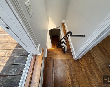E 13th St. - Photo Thumbnail 11