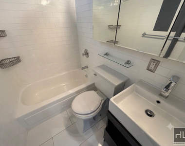 E 13th St. - Photo Thumbnail 14