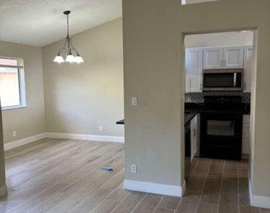 1088 Coral Club Drive - Photo Thumbnail 2
