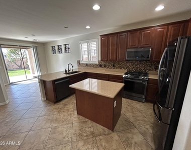 5411 W Rowel Road - Photo Thumbnail 2