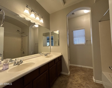 5411 W Rowel Road - Photo Thumbnail 18