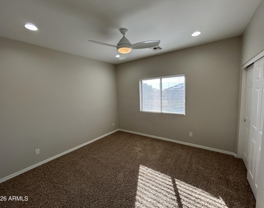 5411 W Rowel Road - Photo Thumbnail 16