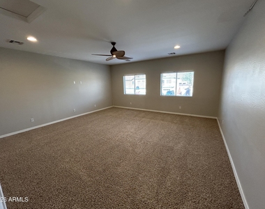 5411 W Rowel Road - Photo Thumbnail 22
