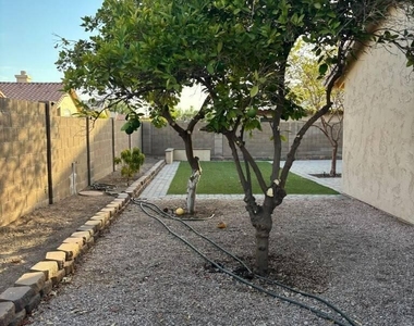 9621 W Potter Drive - Photo Thumbnail 16