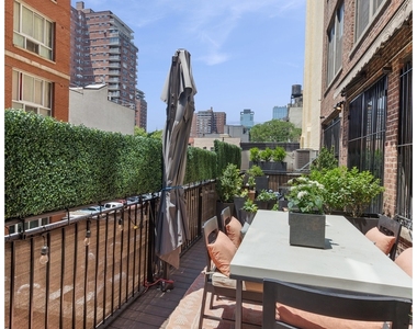 252 W 30th St - Photo Thumbnail 9