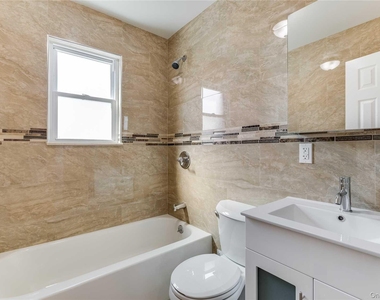 70-14 Olcott Street - Photo Thumbnail 3
