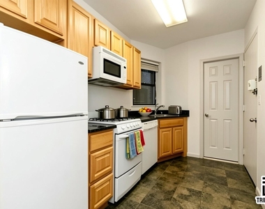 406 W 48th Street - Photo Thumbnail 2