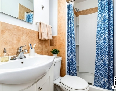 406 W 48th Street - Photo Thumbnail 3