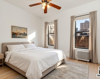 406 W 48th Street - Photo Thumbnail 1
