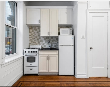 220 E 36th Street - Photo Thumbnail 1