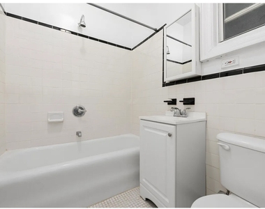 220 E 36th Street - Photo Thumbnail 3