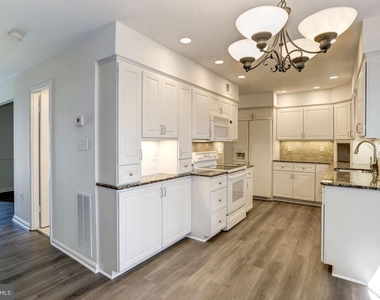9012 Penn Manor Court - Photo Thumbnail 1